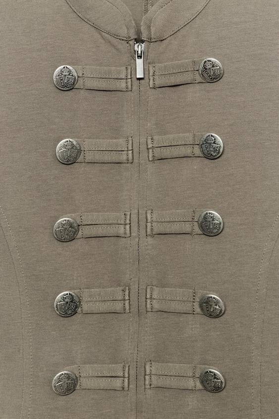 Gilet à fermeture zippée et boutons
