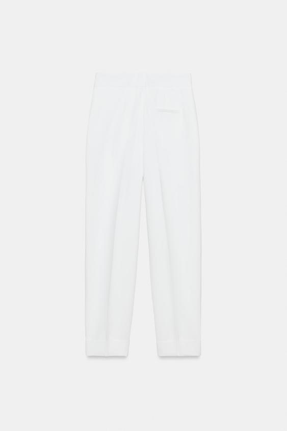 Pantalon à plis avec revers au bas
