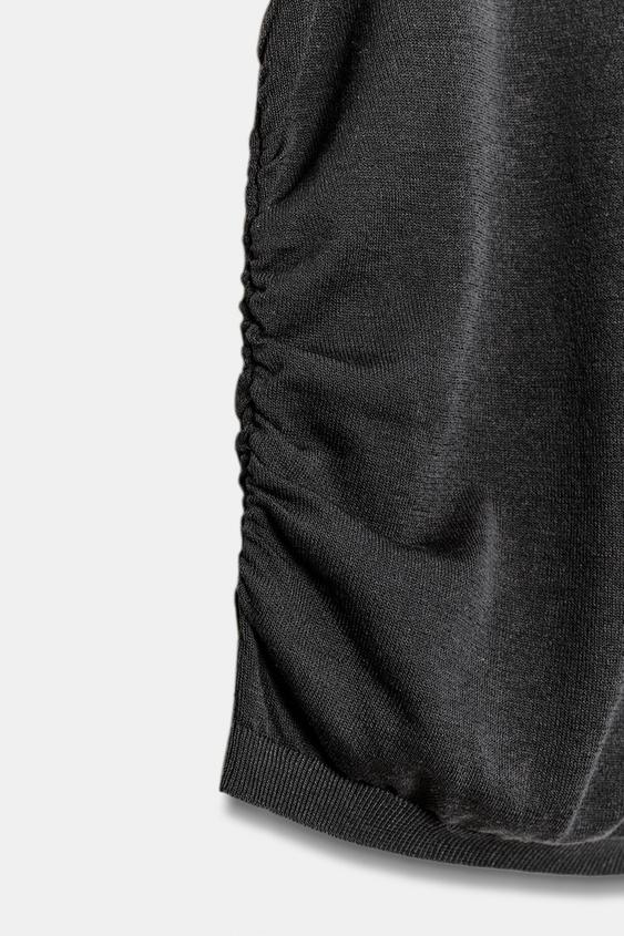 Top drapé en maille
