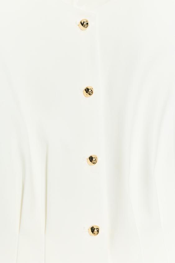 Gilet peplum à pinces