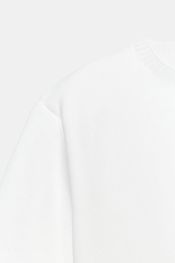 Pull en maille à épaulettes à manches courtes