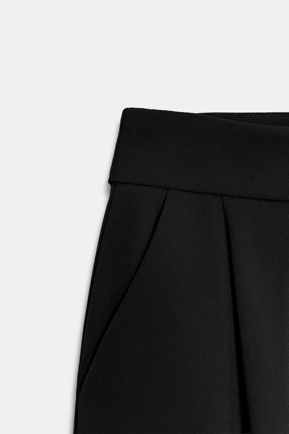 Pantalon palazzo à bouton doré