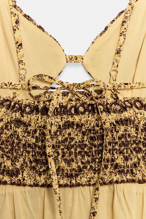 Robe midi brodée ajourée à découpes
