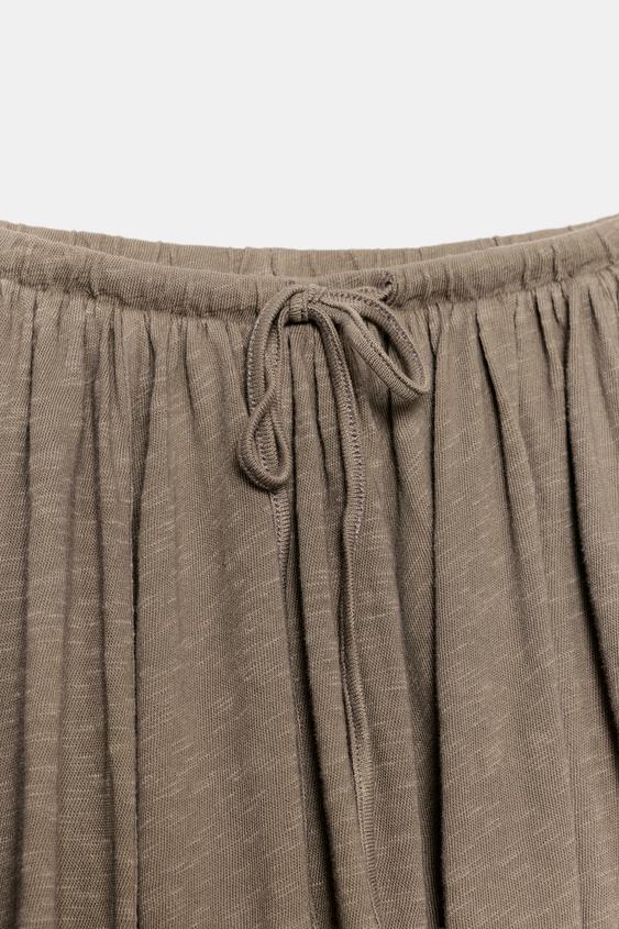 Jupe en tissu flammé à godets