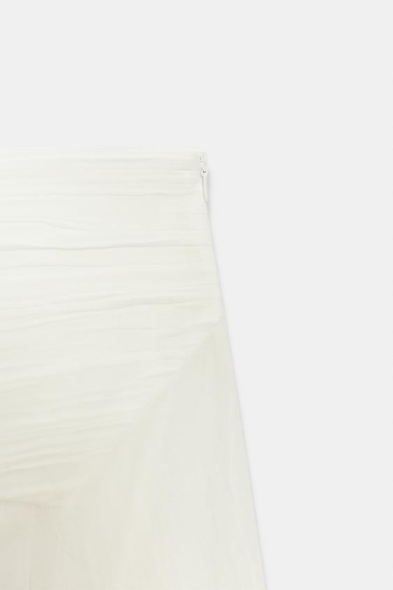 Jupe asymétrique en tissu texturé