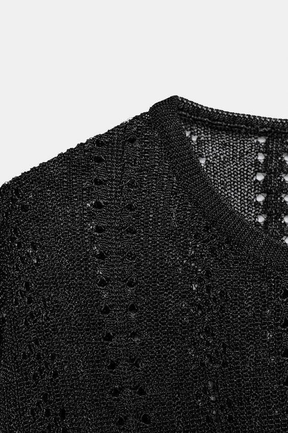 Pull en maille pointelle à fentes