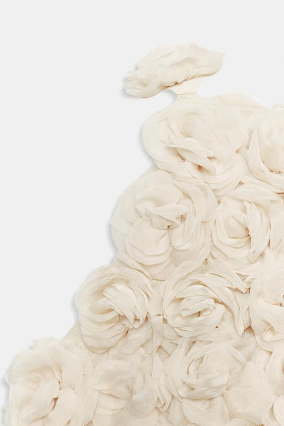 Top dos-nu en maille structurée à fleurs