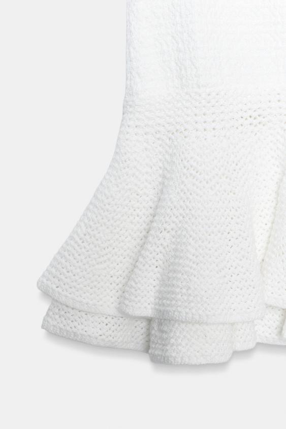 Jupe mini en maille à volants