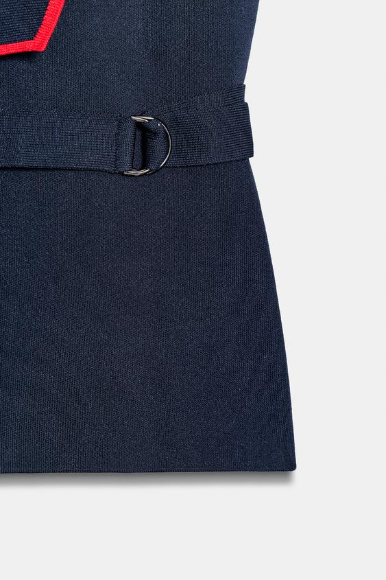 Gilet croisé à boucles
