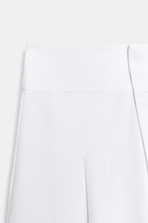 Pantalon coupe ballon à plis