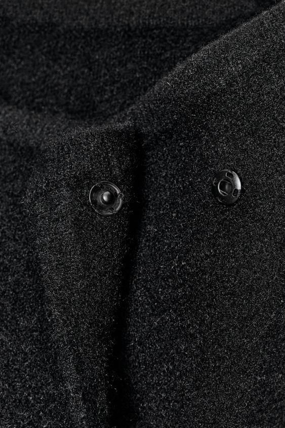 Veste bomber croisée en maille