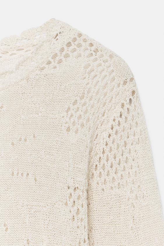 Pull en maille pointelle
