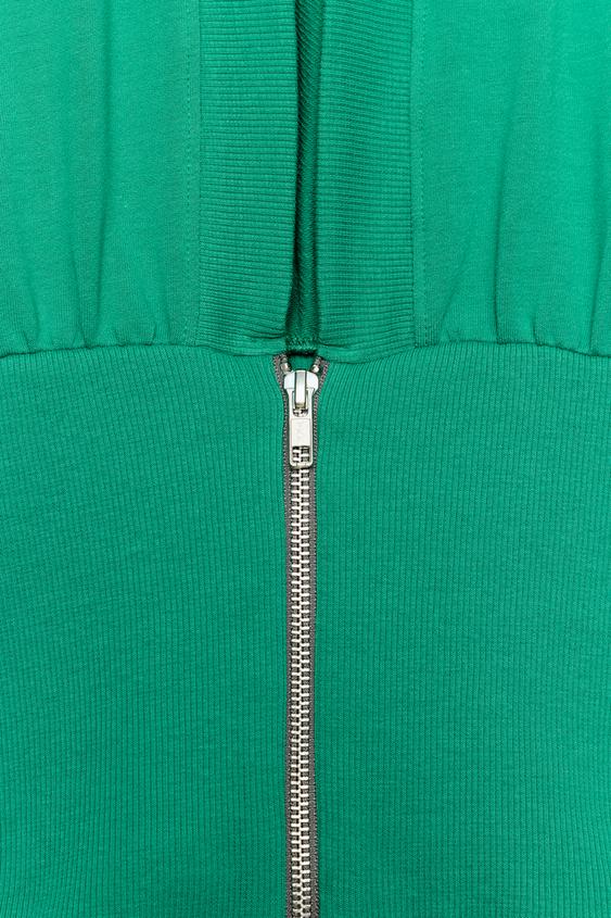 Top à capuche à fermeture zippée