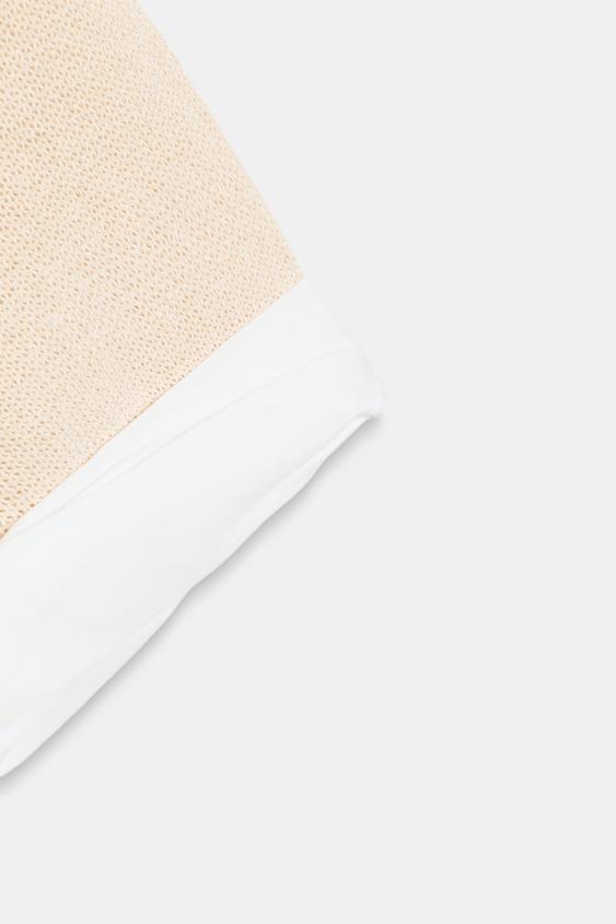 Pull en maille à manches contrastées avec revers