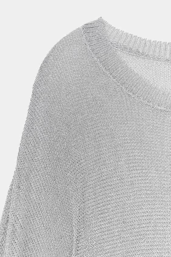 Pull en maille à fil métallisé