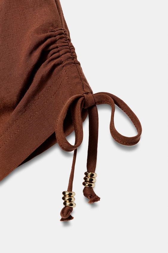 Veste safari à manches courtes à perles
