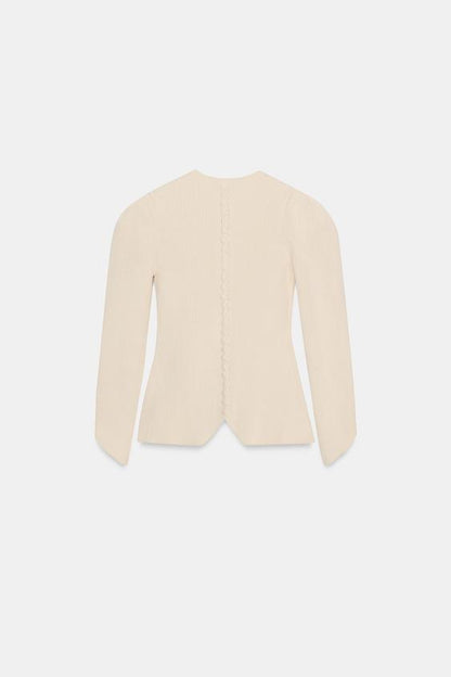 Veste en maille à manches bouffantes