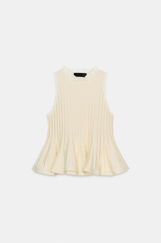 Top côtelé en maille peplum