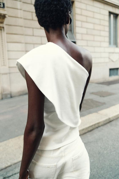 Top asymétrique en interlock