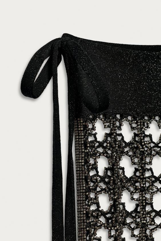 Paréo ajourés à perles à franges Marisa Berenson x Zara
