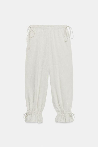 Pantalon bouffant à rayures et liens noués