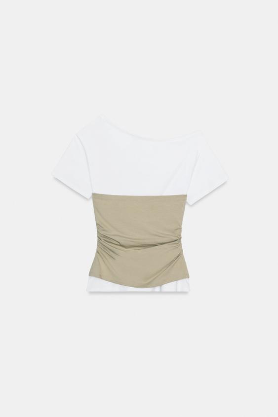 Top asymétrique à fronces