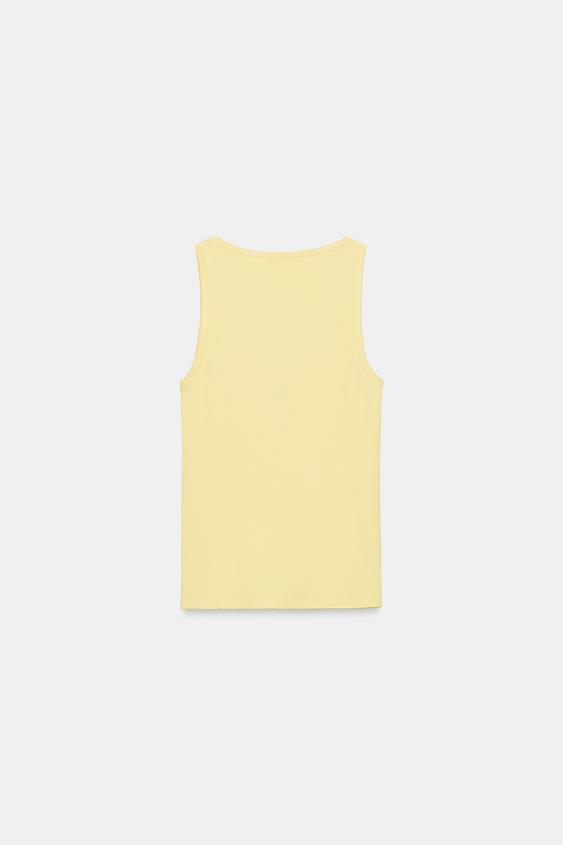 Top à broderie sur le devant