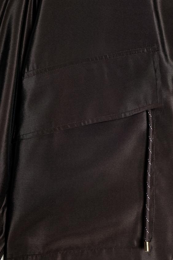 Veste à col montant taille réglable