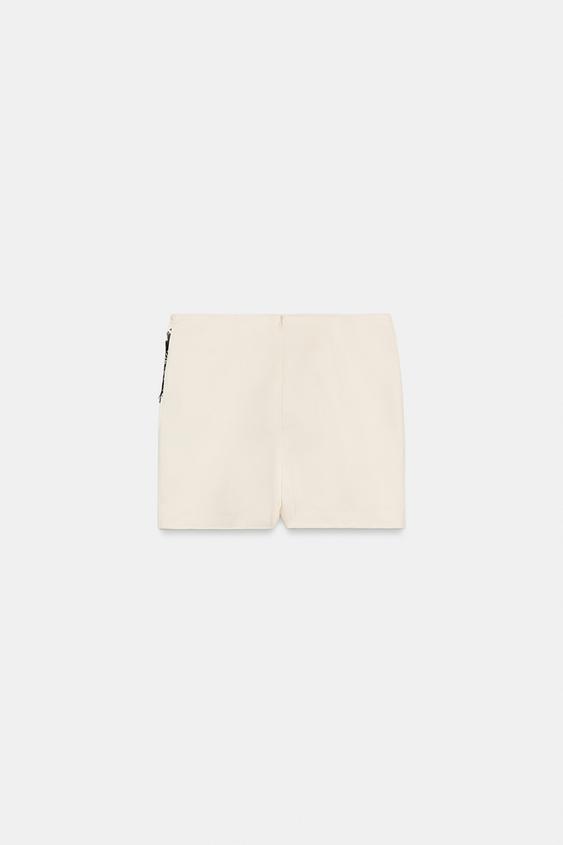 Jupe-culotte croisée en dentelle