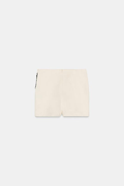 Jupe-culotte croisée en dentelle