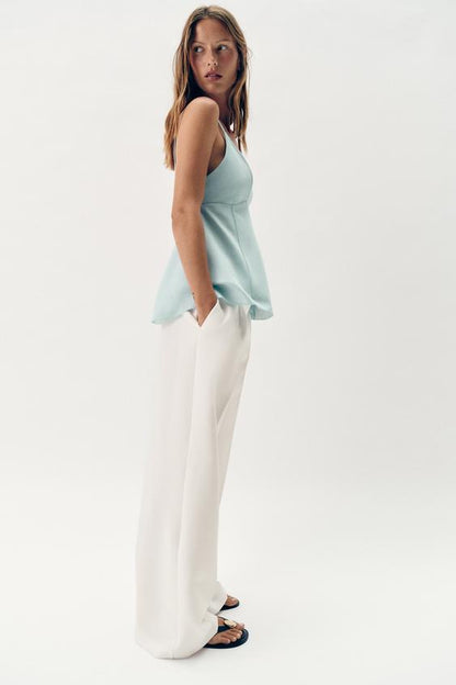 Top peplum à bretelles
