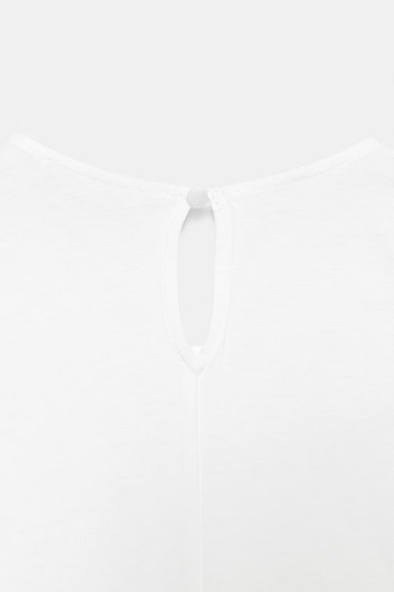 Top en dentelle sans manches