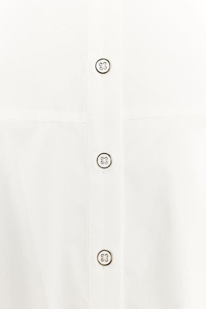 Chemise dos-nu peplum