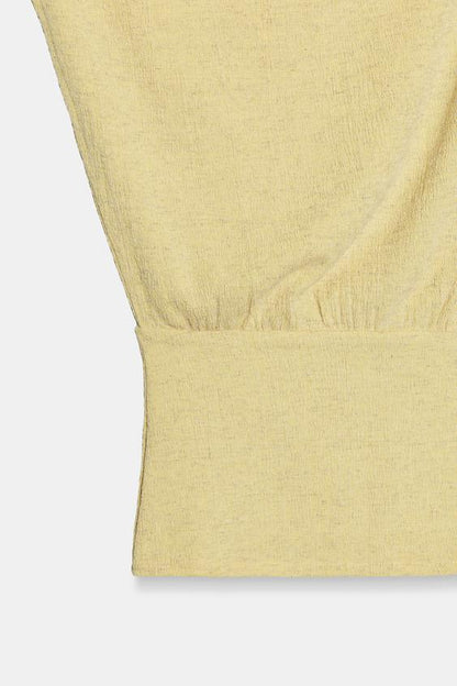 Top asymétrique texturé