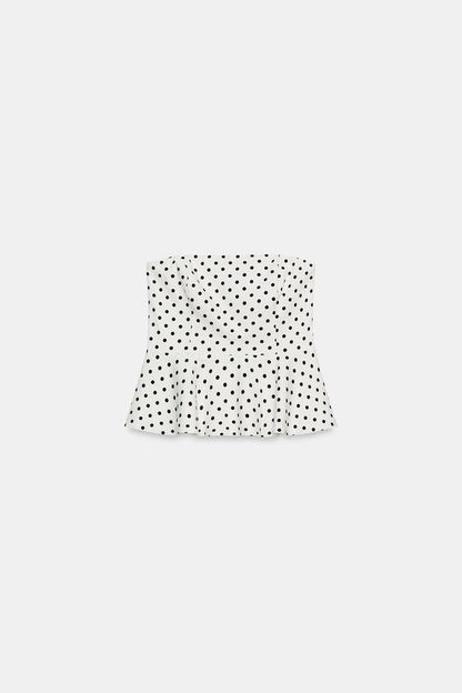 Top bustier peplum à pois