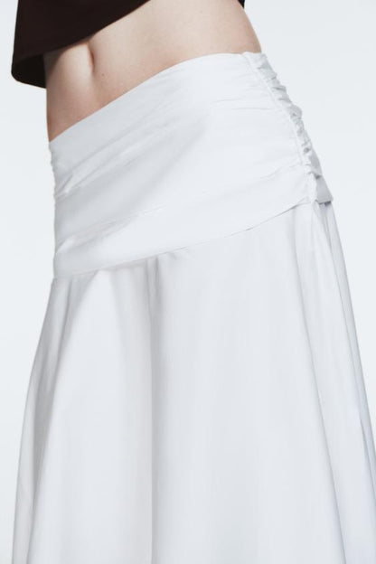 Jupe midi à volume