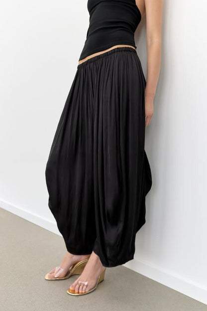 Pantalon bouffant à plis