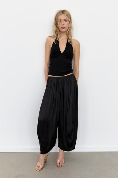 Pantalon bouffant à plis