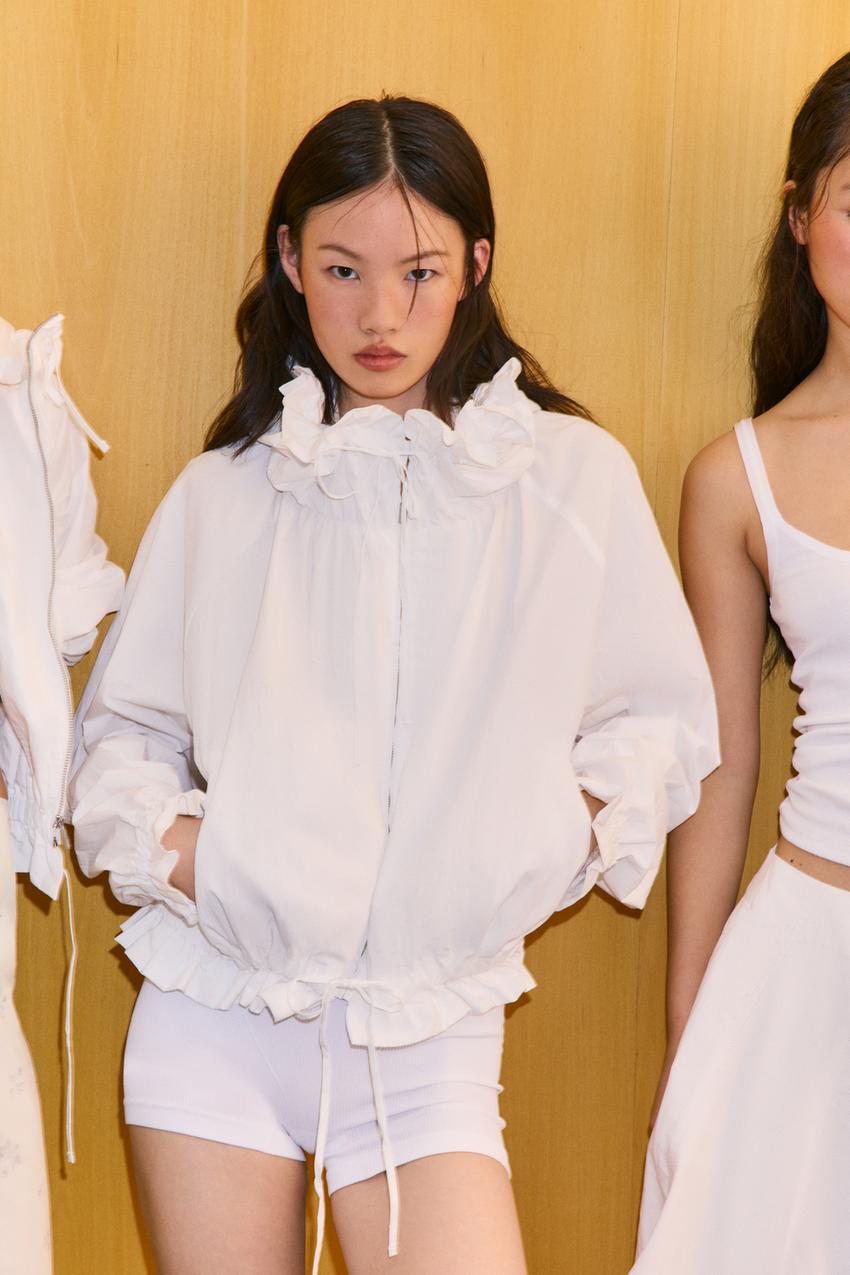 Veste à fermeture zippée à volants