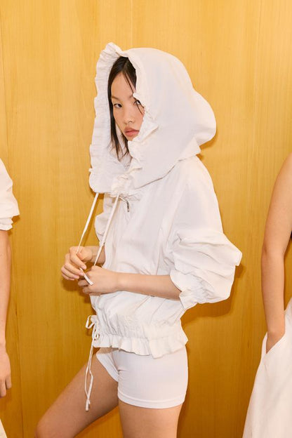 Veste à fermeture zippée à volants
