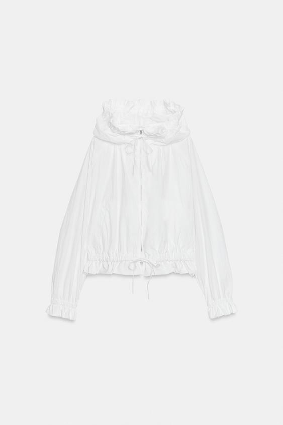 Veste à fermeture zippée à volants