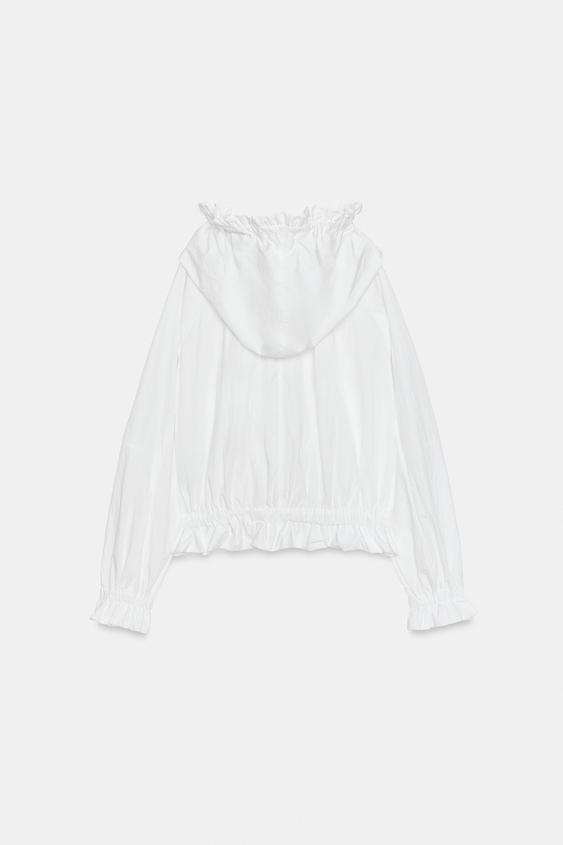 Veste à fermeture zippée à volants