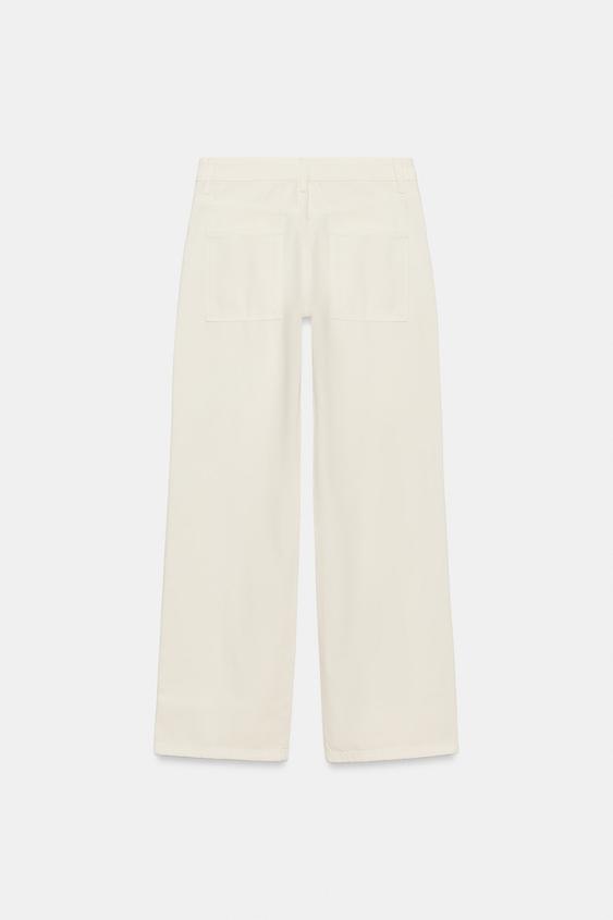 Pantalon coupe droite taille basse à œillets