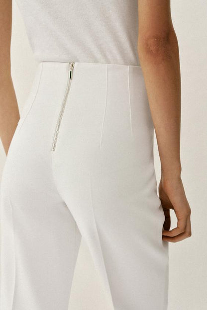 Pantalon taille haute à fermeture zippée au dos