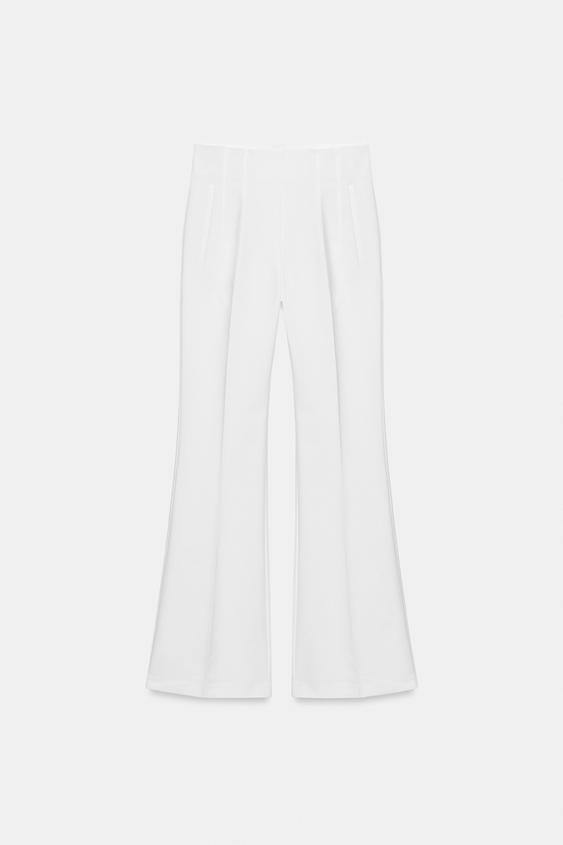Pantalon taille haute à fermeture zippée au dos