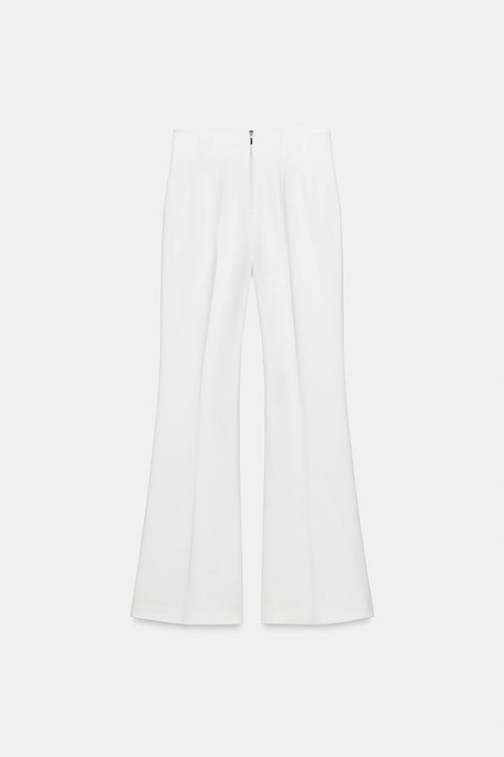 Pantalon taille haute à fermeture zippée au dos
