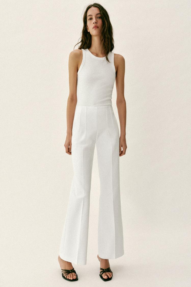 Pantalon taille haute à fermeture zippée au dos