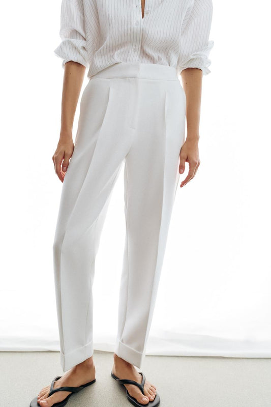 Pantalon à plis avec revers au bas