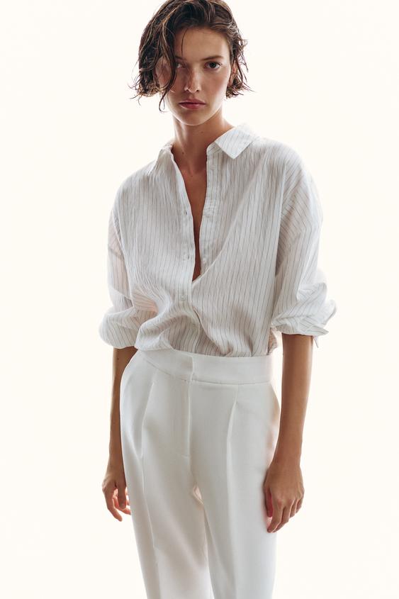 Pantalon à plis avec revers au bas