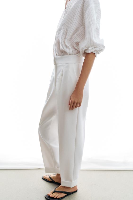 Pantalon à plis avec revers au bas